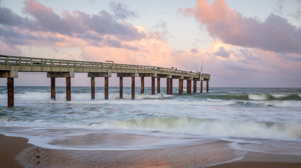 St. Johns County Ocean Pier which includes general coastal views and a sunset