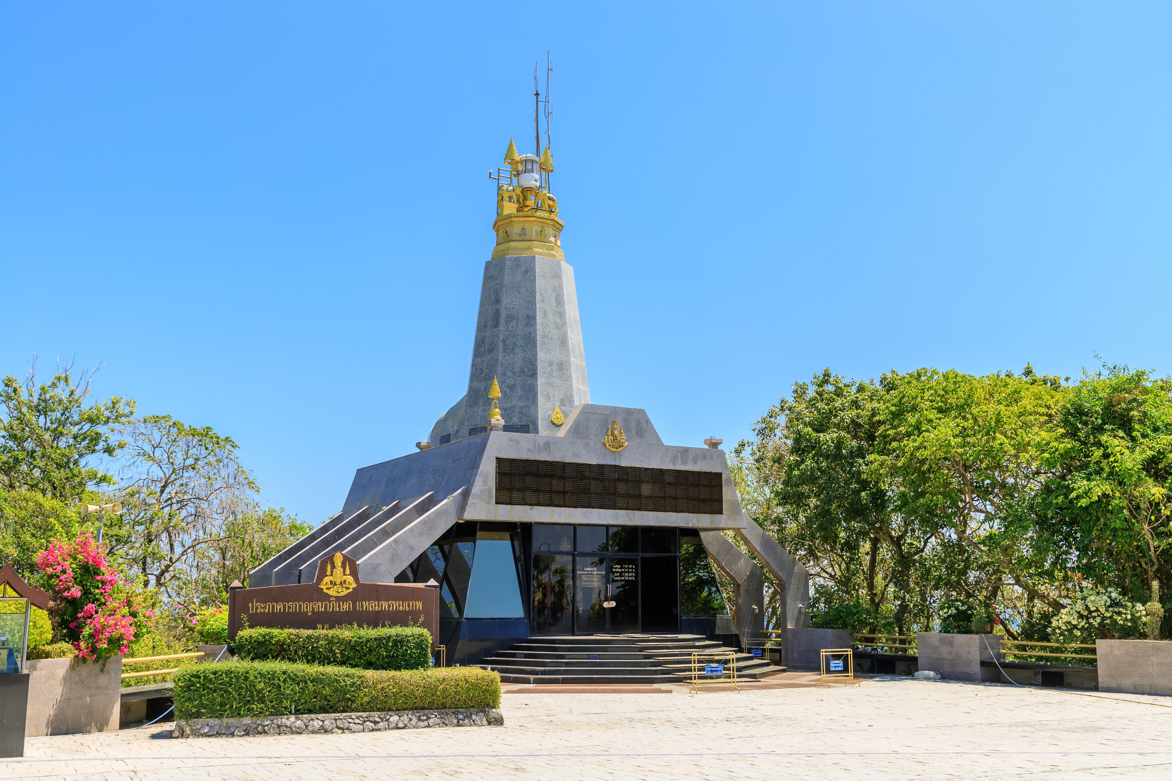 Kanchanapisek or The Golden Jubilee Lighthouse and Prince of Chumphon Statue at Laem Promthep Cape, Phuket, Thailand