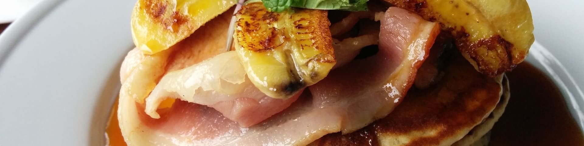 Pancakes, bacon round, and cooked bananas, topped with mint leaves. Best breakfast in all of Fiji.
#delicious