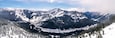 Panorama of Snowy Mountain Road and Winter Sports Resort in Pacific Northwest Forest