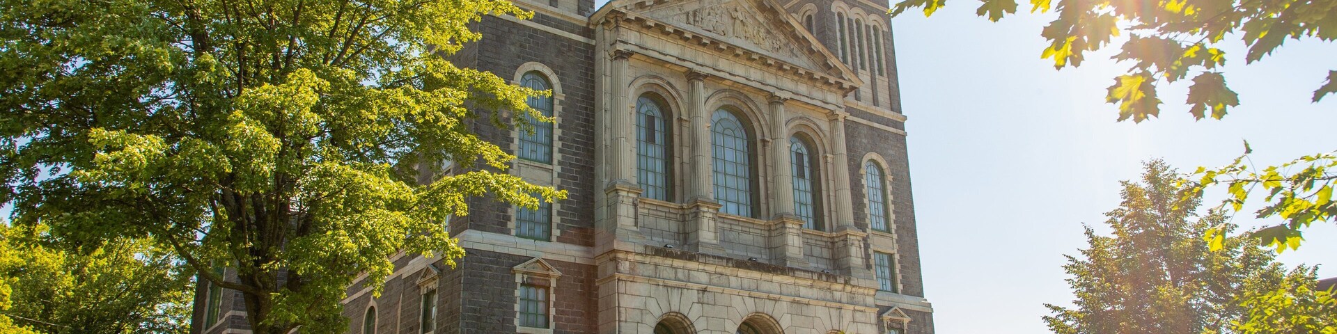 Cathedrale Saint-Francois-Xavier showing heritage architecture and a sunset