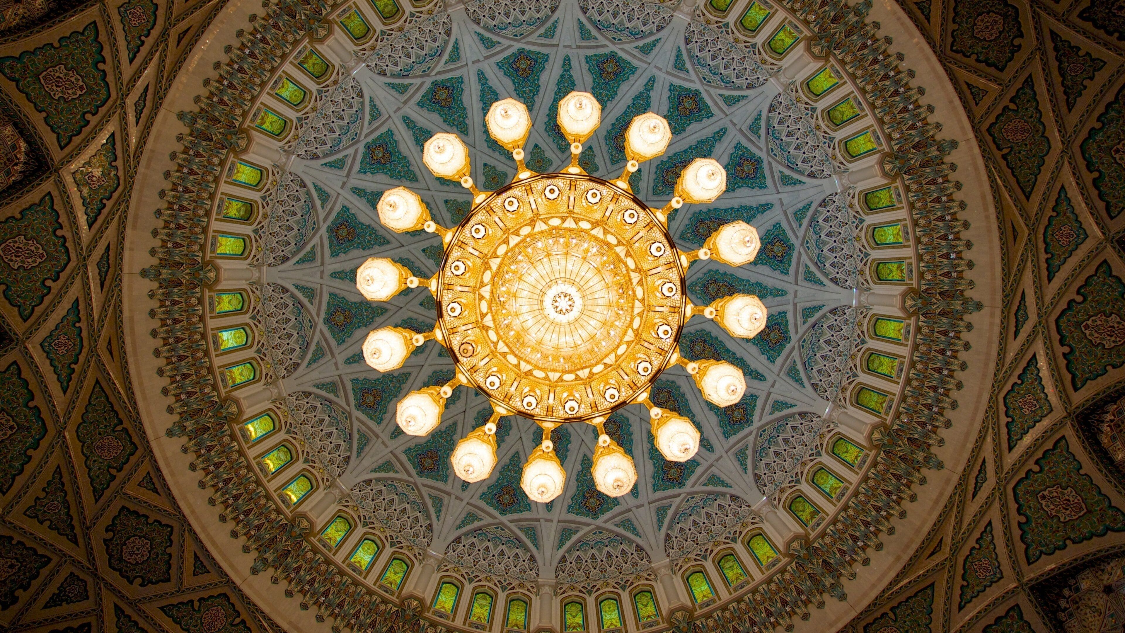 Sultan Qaboos Grand Mosque showing interior views, religious elements and a mosque