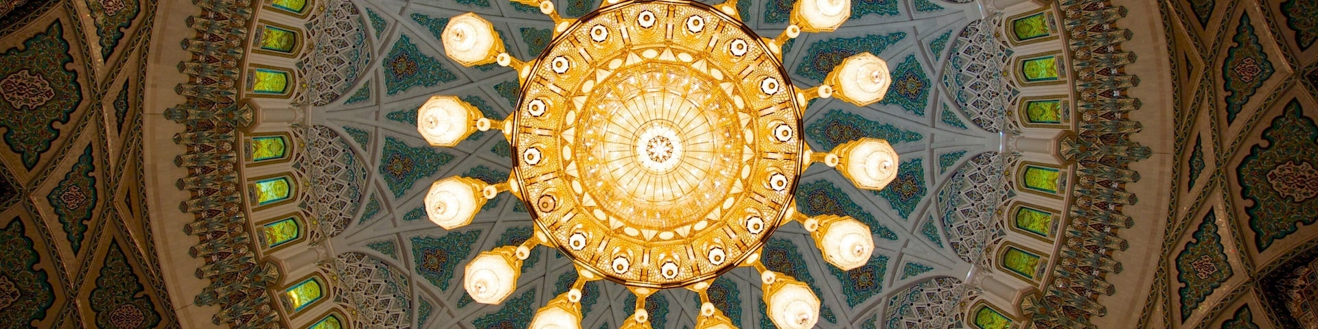 Sultan Qaboos Grand Mosque showing interior views, religious elements and a mosque