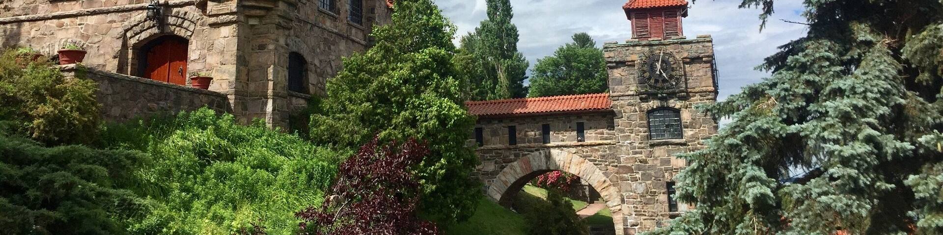 Built by the fifth president of the Singer Sewing Machine company as a hunting lodge in the early 1900's. it has changed owners several times and is currently owned by a group of Europeans who preserve castles. It has a large suite on the third floor that is available to stay in overnight for a fee.