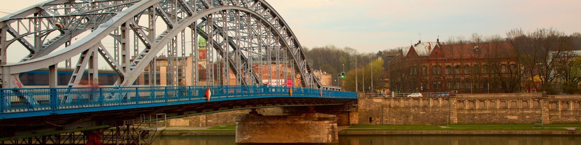 Krakow showing a bridge and a river or creek