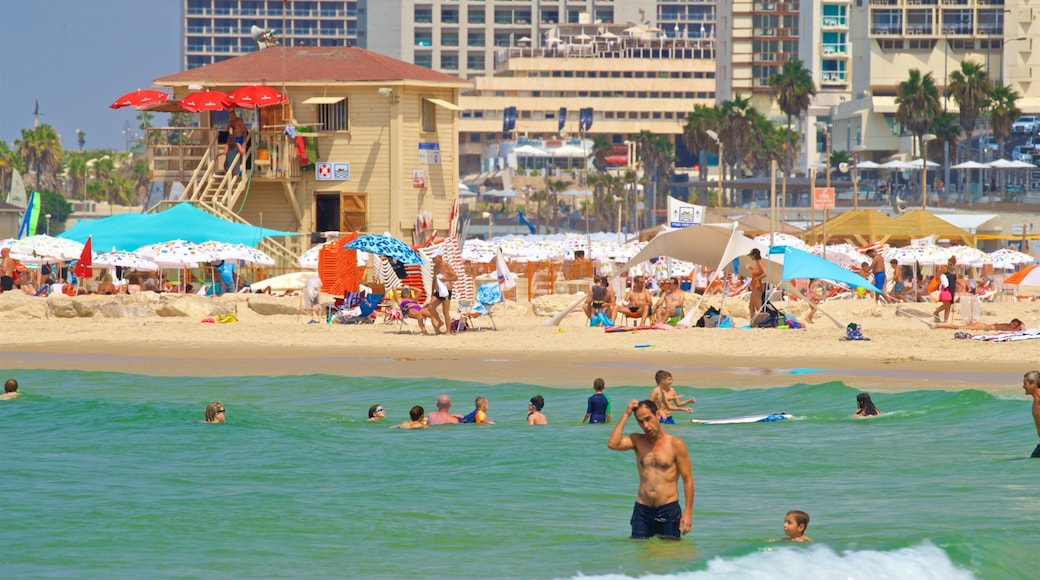 Jerusalem Strand som viser svømning, udsigt over kystområde og en sandstrand