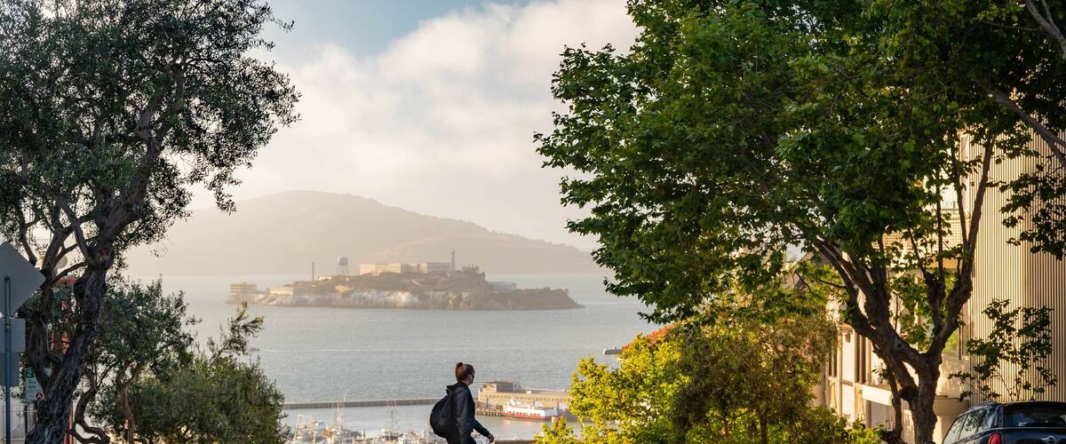 Russian Hill featuring street scenes as well as an individual femail