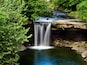 A beautiful creamy, milky waterfall with the motion frozen, nestled into a park in New Castle, Pennsylvania. Beauty in nature, landscape photography.