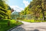 Borjomi Central Historical Park. Georgia. Source with healing mineral water. Beautiful pavilion with a glass dome.