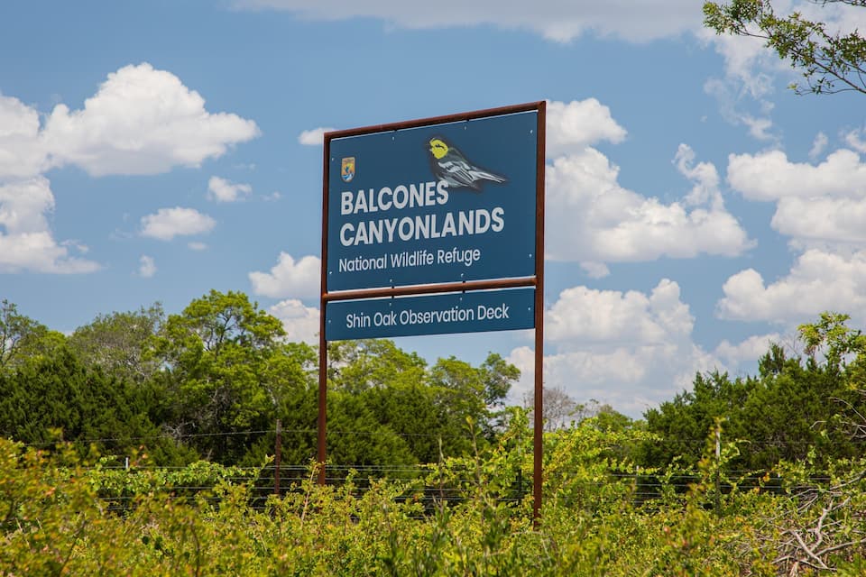 A sign for Balcones Canyonlands National Wildlife Refuge and Shin Oak Observation Deck.