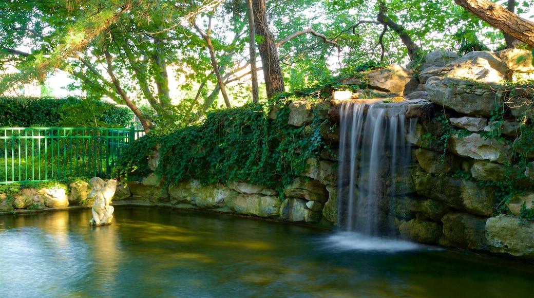 Shelter Gardens which includes a waterfall and a pond
