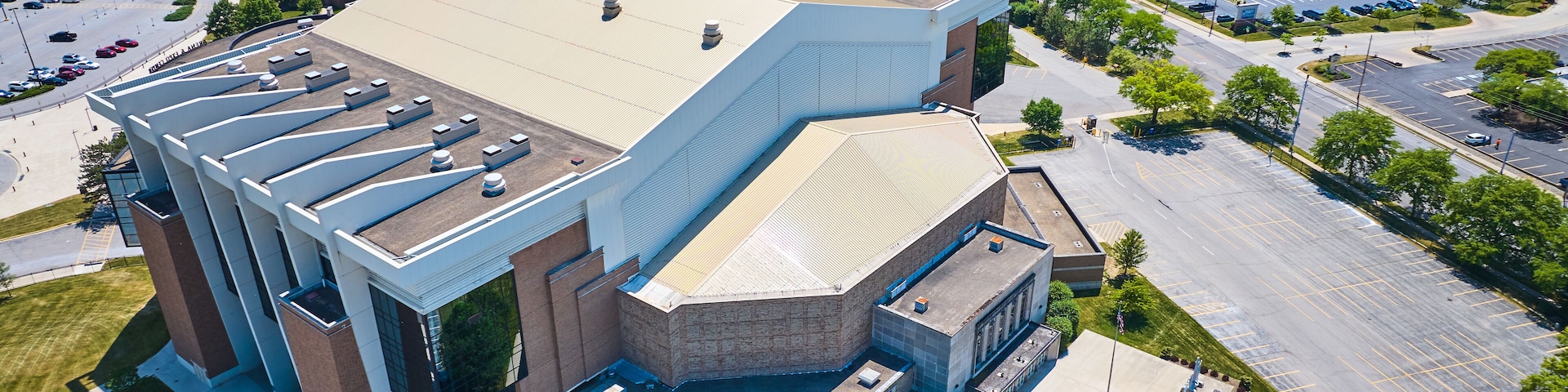 Aerial side view of Allen County War Memorial Coliseum with emphasis on memorial and plane
