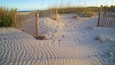 Great Dunes Park fasiliteter samt solnedgang, kyst og sandstrand