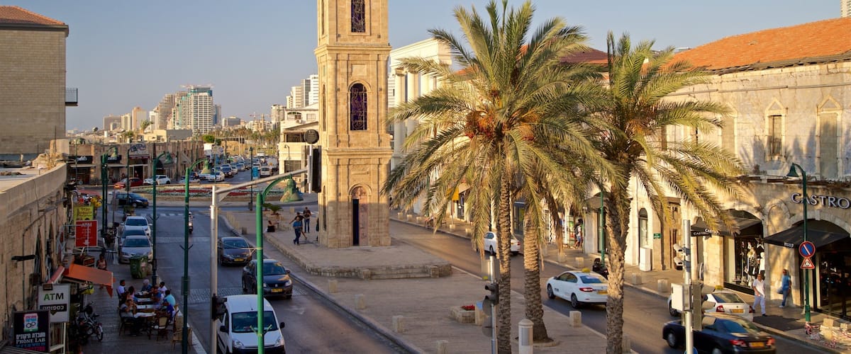 Jaffa Clock Tower featuring a city, a sunset and heritage architecture