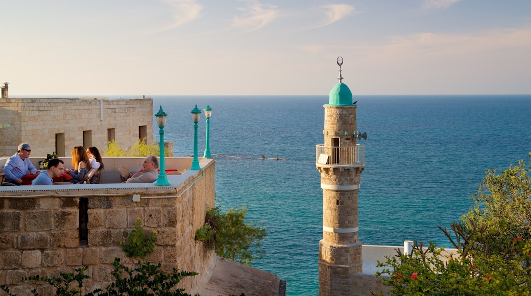 Sea Mosque showing a sunset, heritage elements and general coastal views