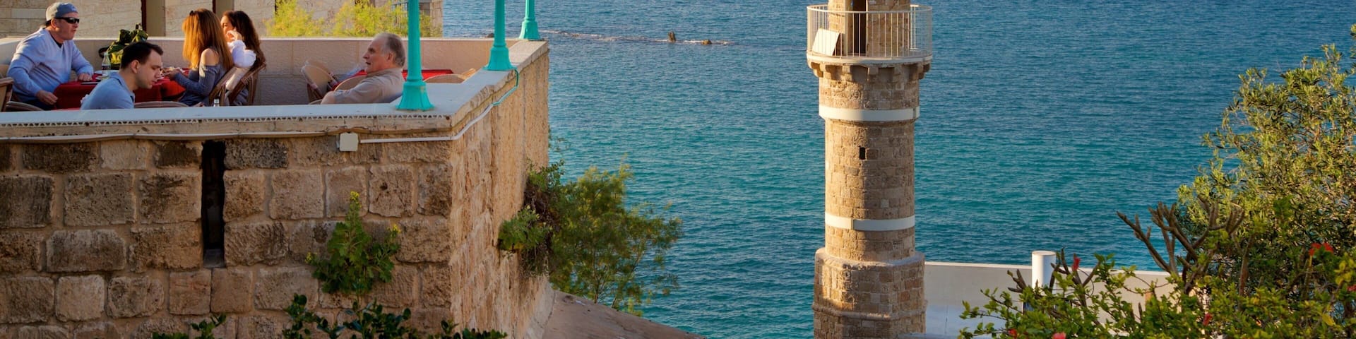 Sea Mosque showing a sunset, heritage elements and general coastal views