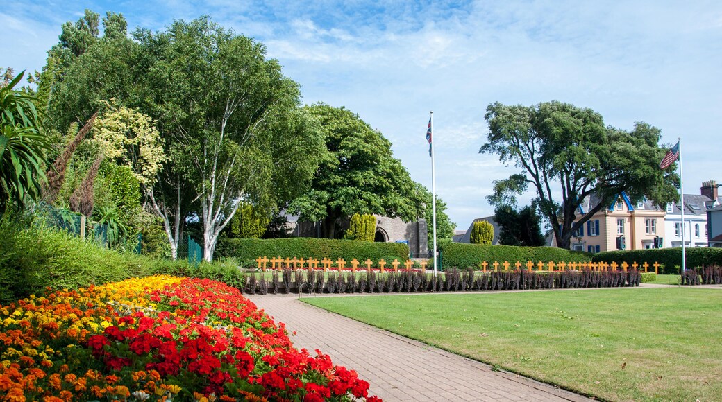 PGM57E The colourful allied forces cemetery in Howard Davis Park in St Helier on the island of Jersey. The image was taken on a warm summers day in July.