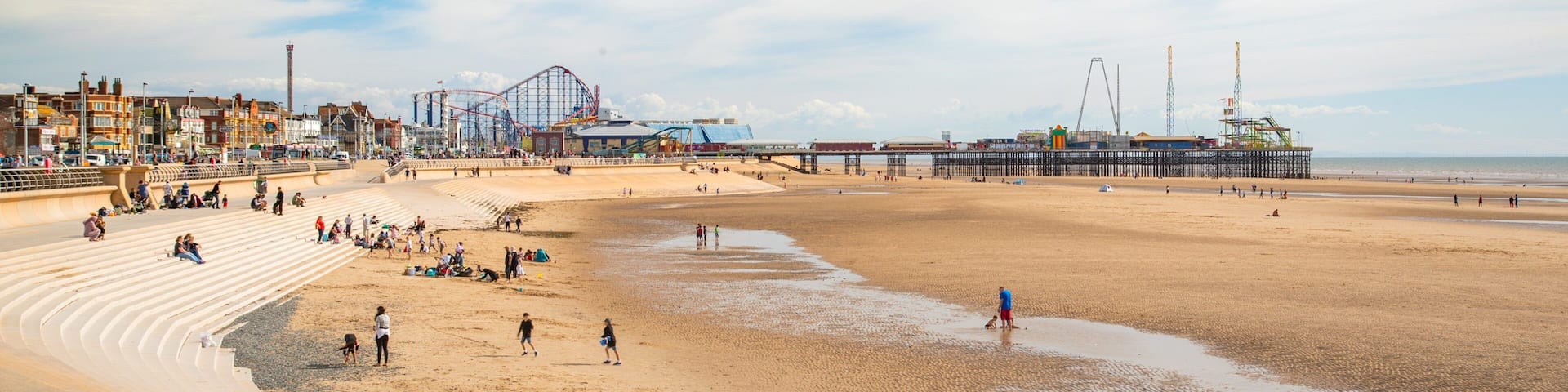 South Pier which includes a beach and general coastal views