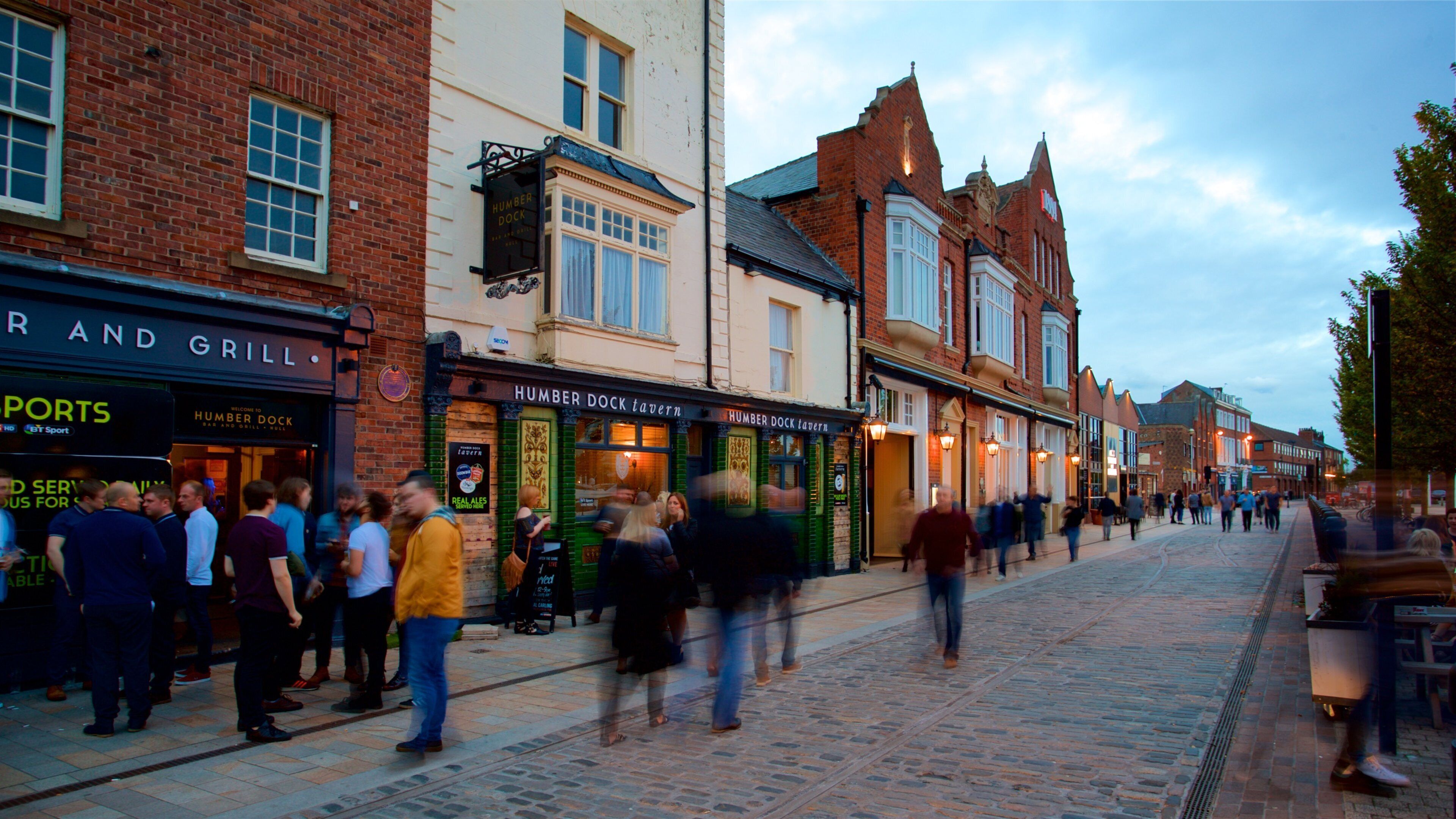 Hull Marina featuring street scenes as well as a small group of people
