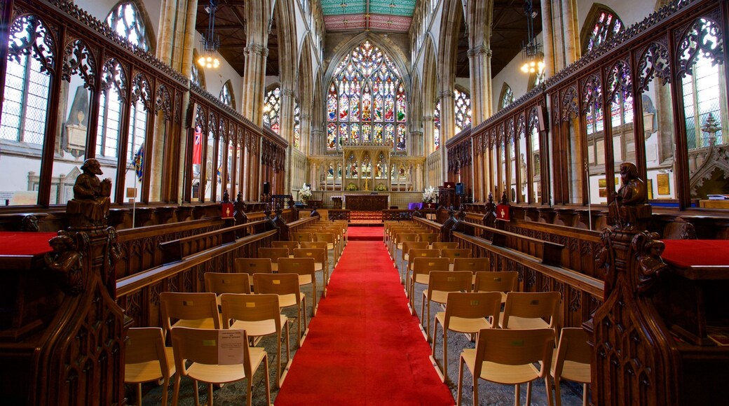 Holy Trinity Church featuring heritage elements, a church or cathedral and interior views