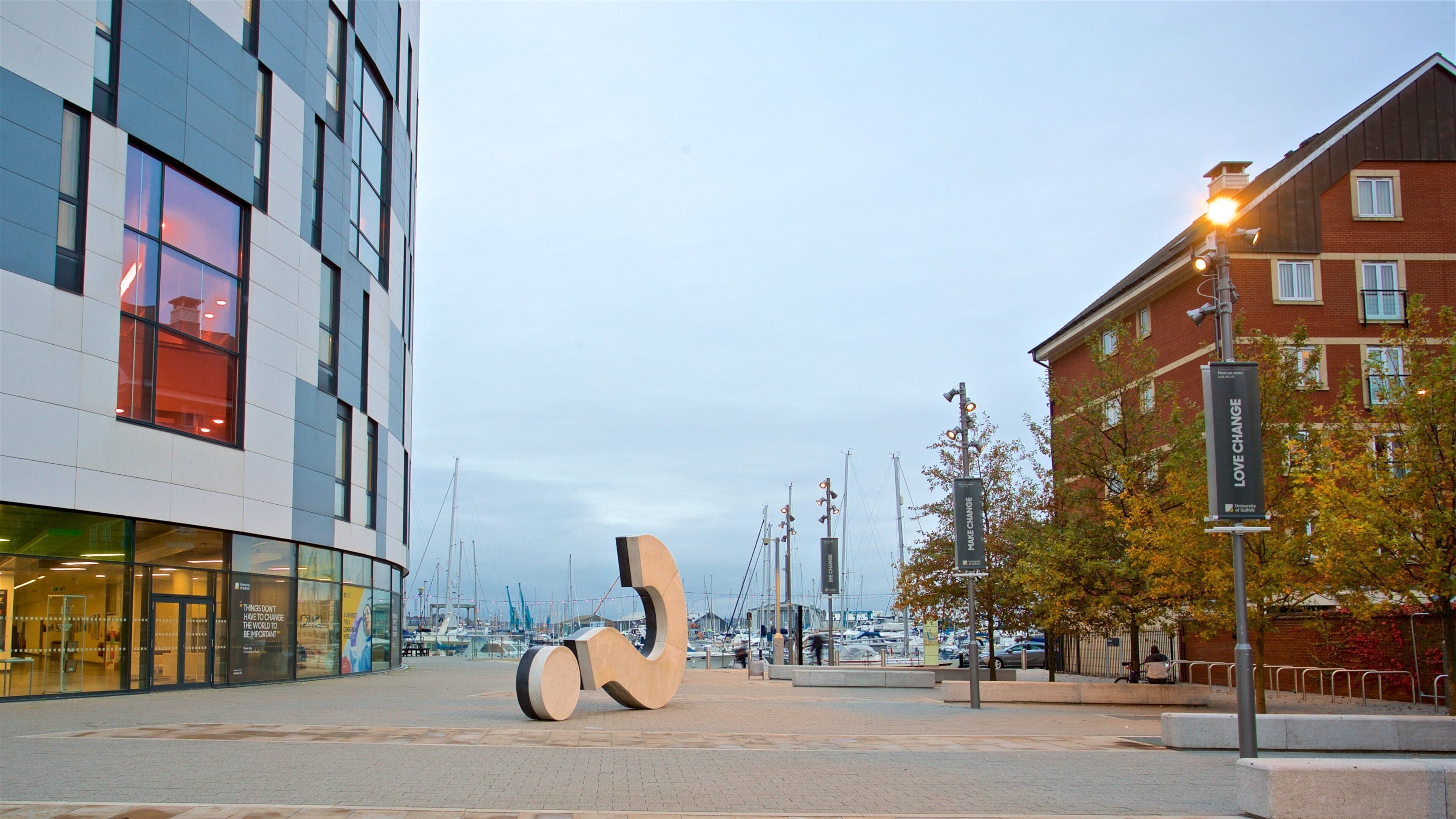 The Question Mark Sculpture showing a bay or harbor and outdoor art