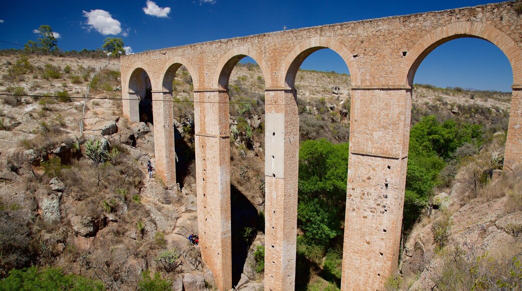 Huichapan featuring heritage architecture, a bridge and tranquil scenes