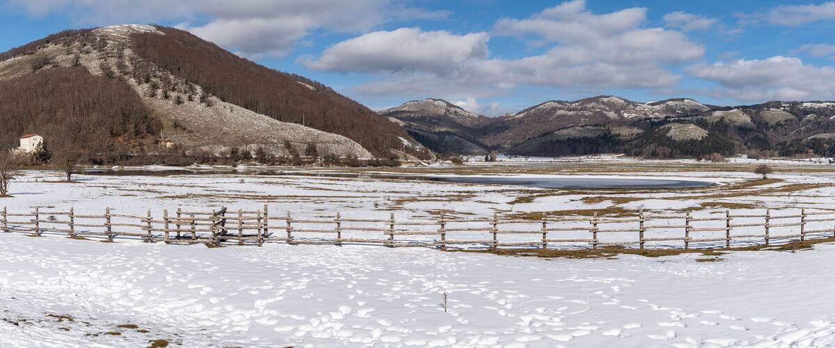 Wide panoramic view of Laceno Lake during winter season, Campania region, Italy