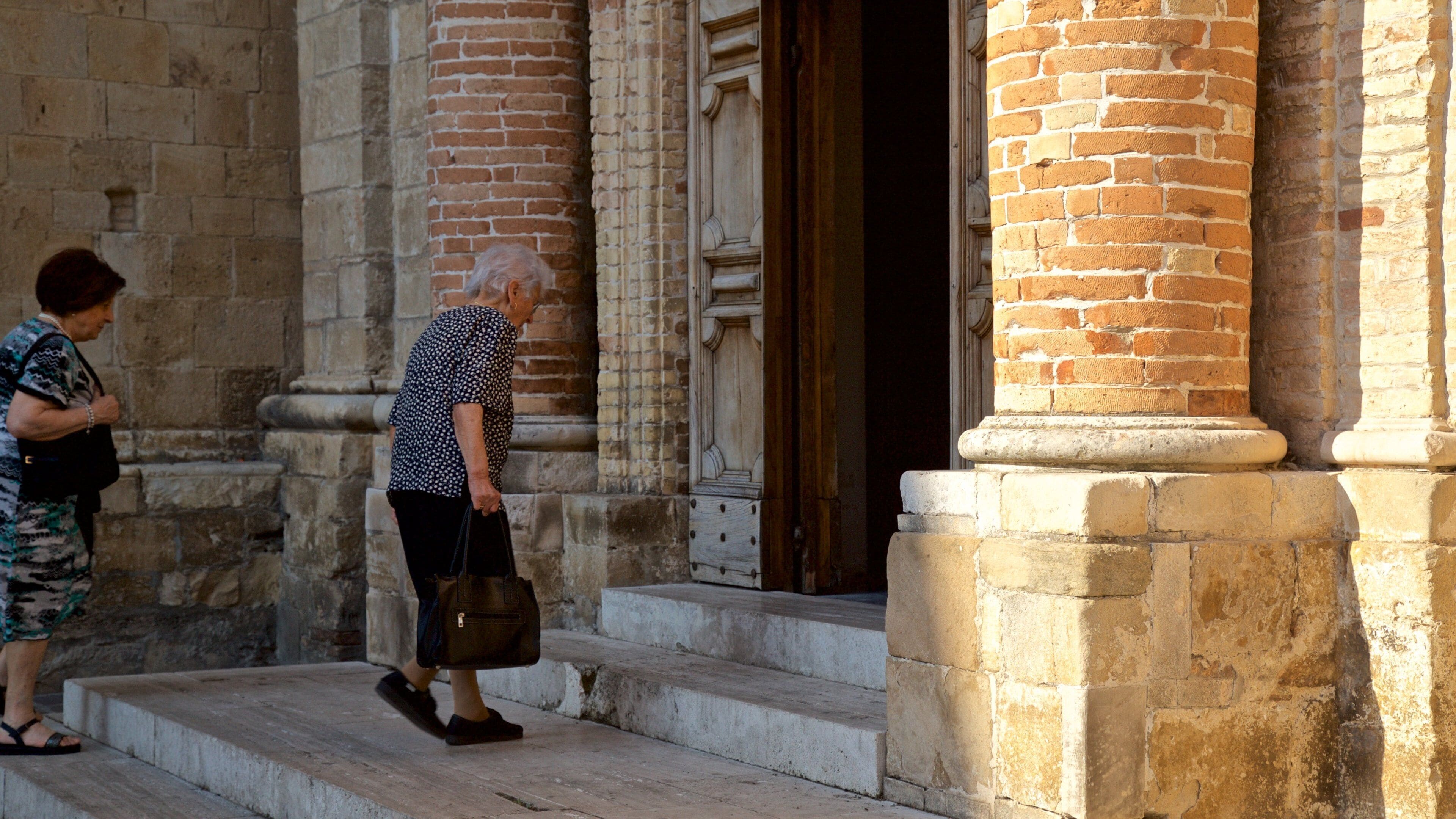 Cathedral of Santa Maria Assunta as well as an individual female