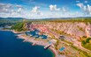 View from flying drone opf Marina di Portopiccolo, Golfo di, Trieste TS, Italy, Europe. Stunning summer scene of Portopiccolo Sistiana Beach. Aerial landscape photography.