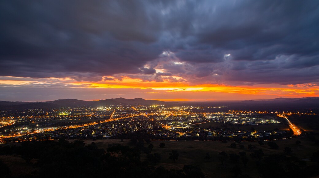 Huon Hill Parklands featuring landscape views, night scenes and a sunset