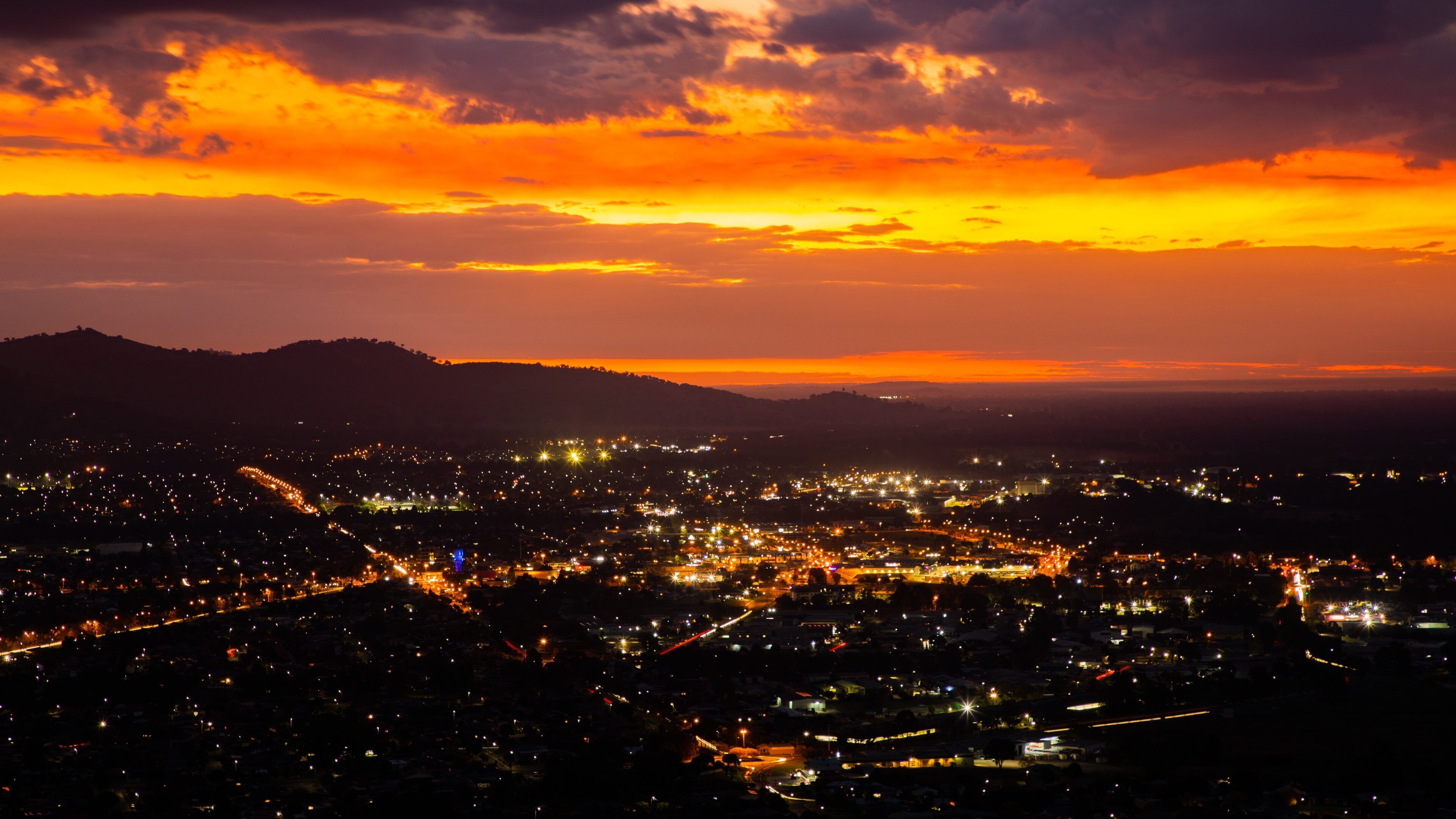 Huon Hill Parklands featuring night scenes, landscape views and a city