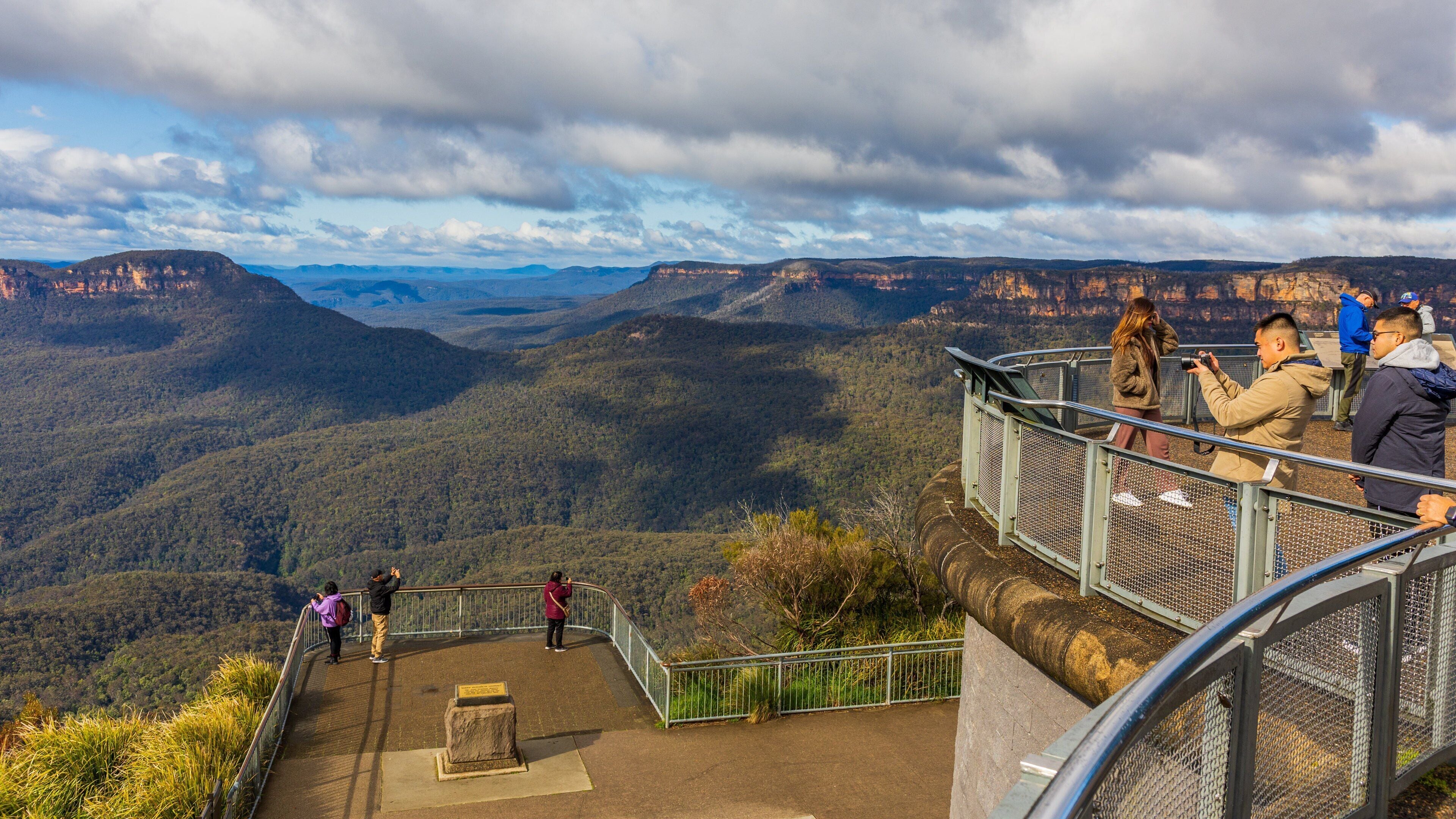 Echo Point Lookout featuring tranquil scenes and views as well as a small group of people