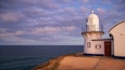 Tacking Point Lighthouse which includes a lighthouse and general coastal views