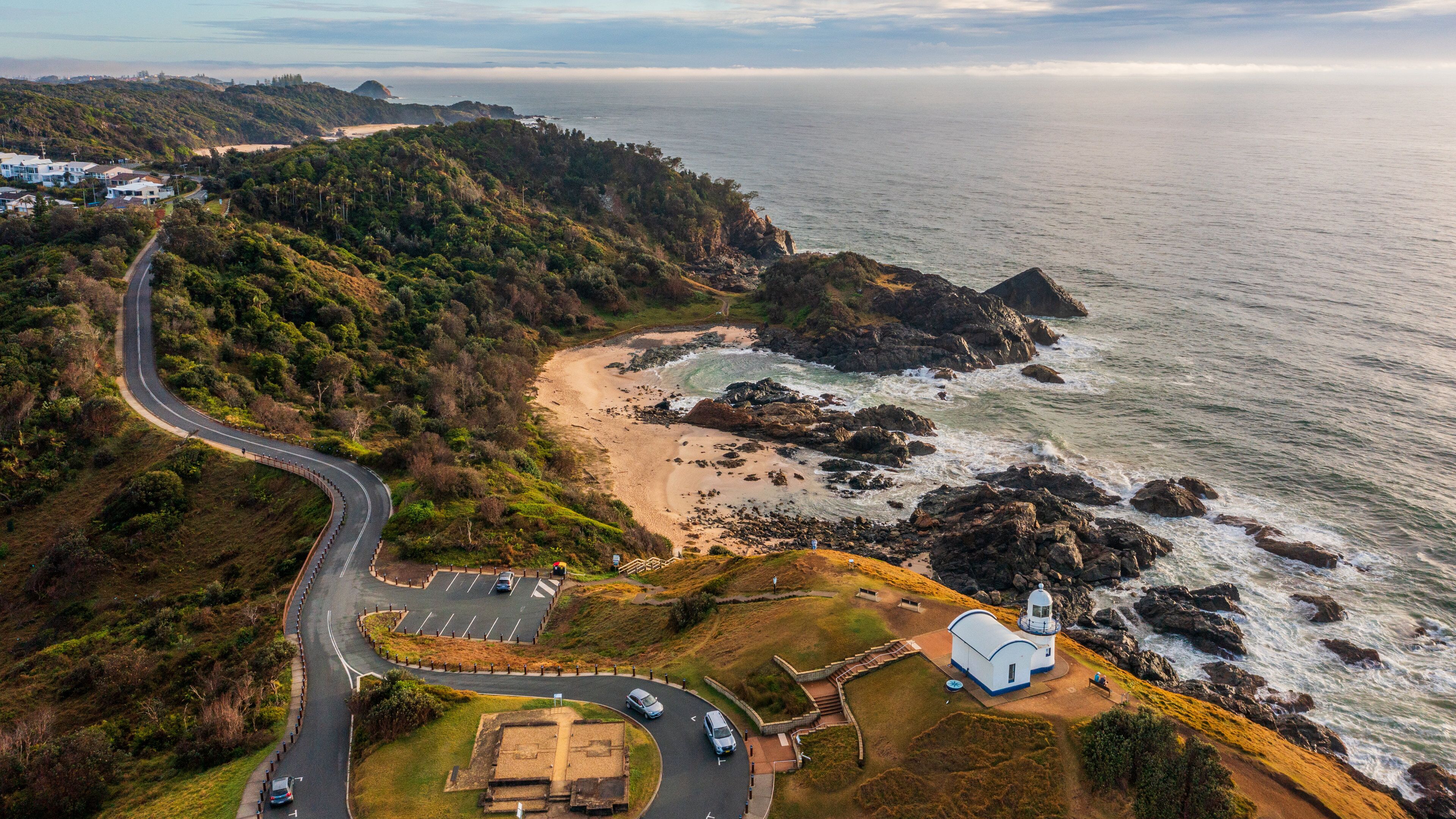 Tacking Point Lighthouse featuring general coastal views, rocky coastline and a lighthouse