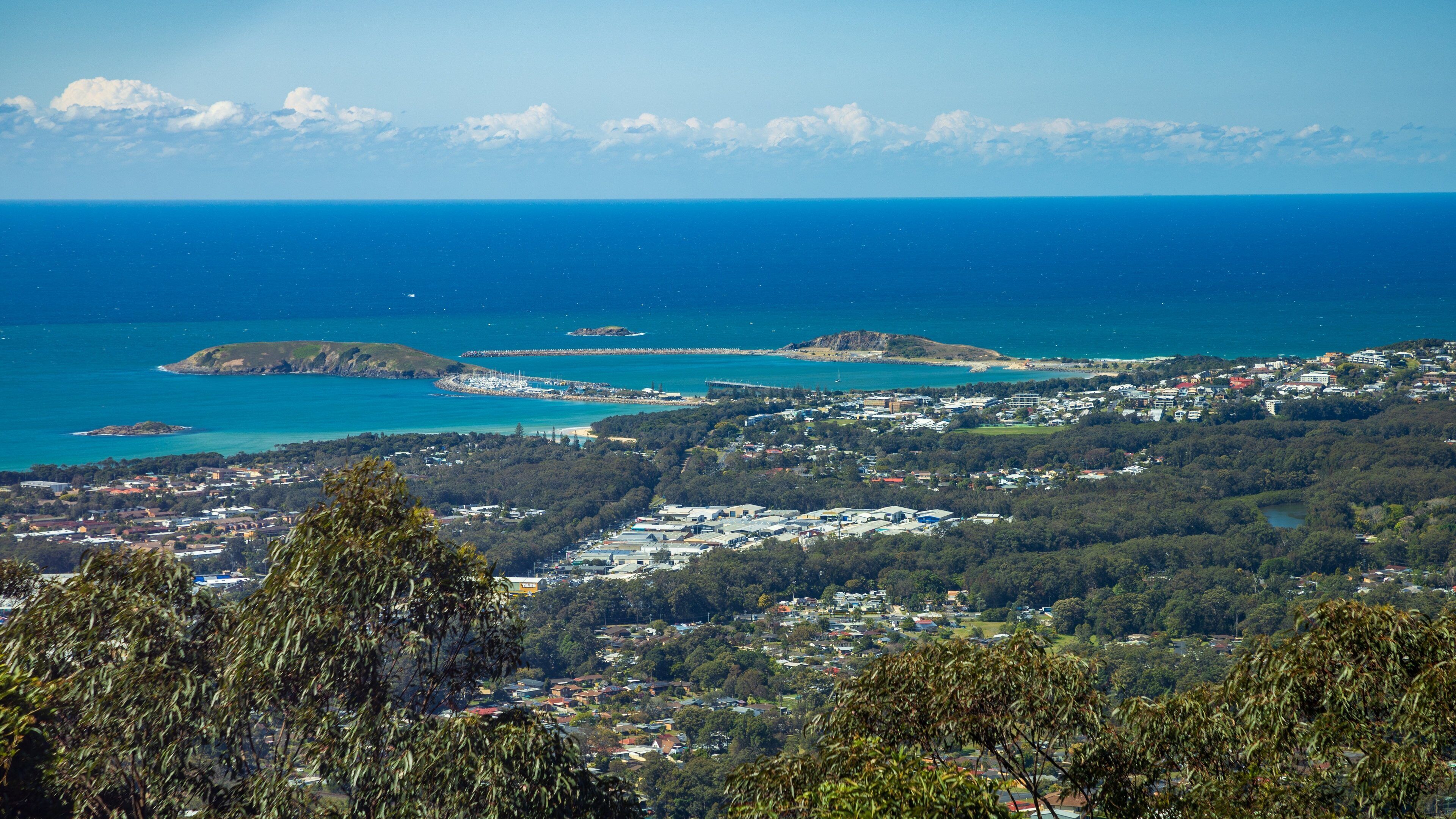 Forest Sky Pier showing landscape views, a coastal town and general coastal views