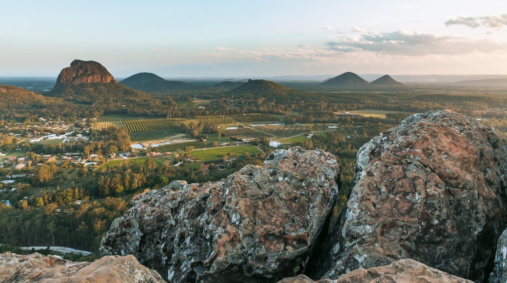 Mount Ngungun which includes landscape views, tranquil scenes and a sunset