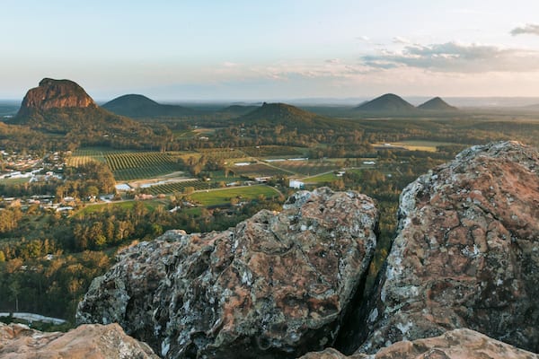 Mount Ngungun which includes landscape views, tranquil scenes and a sunset