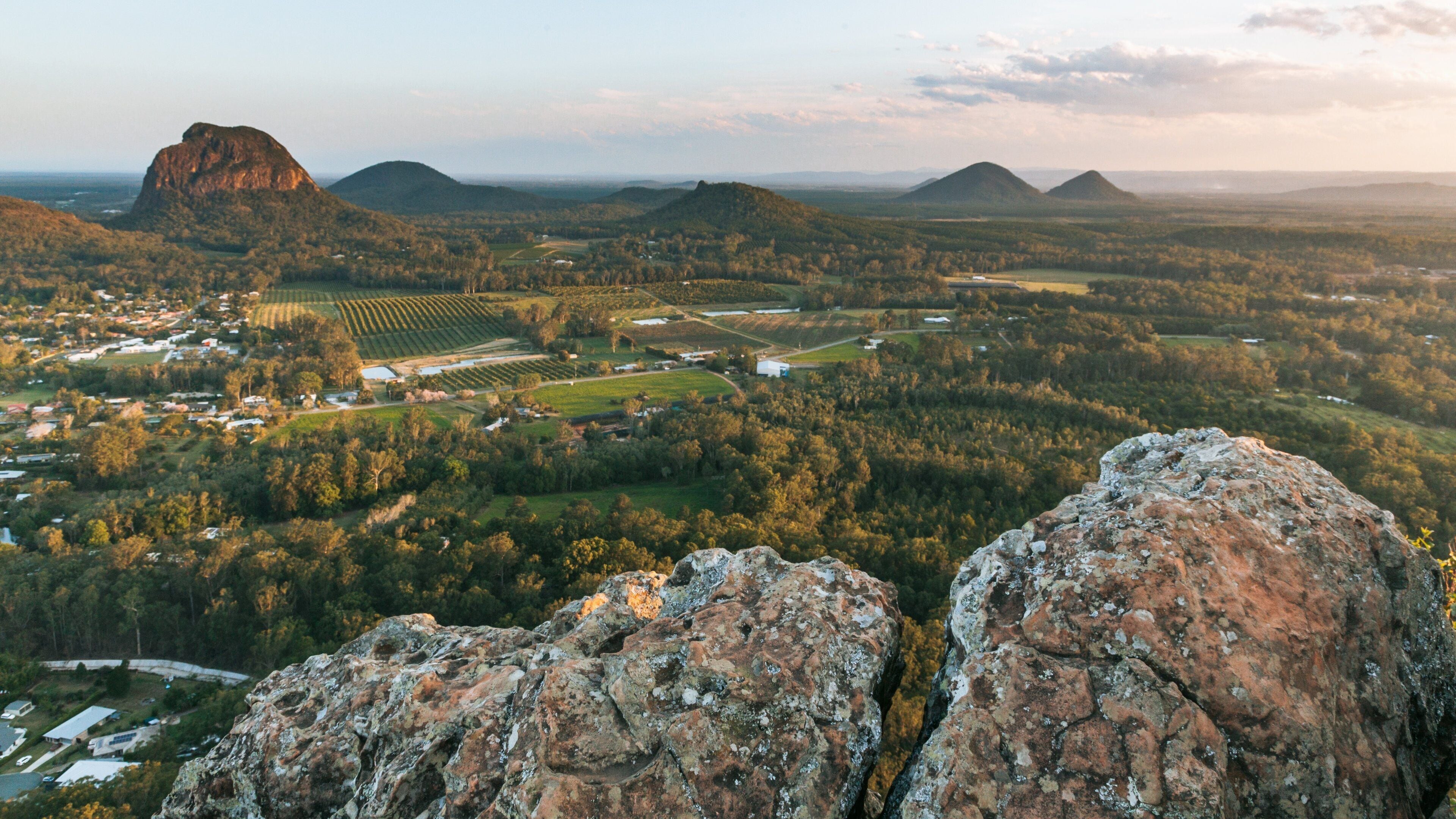 Mount Ngungun featuring landscape views, mountains and a sunset
