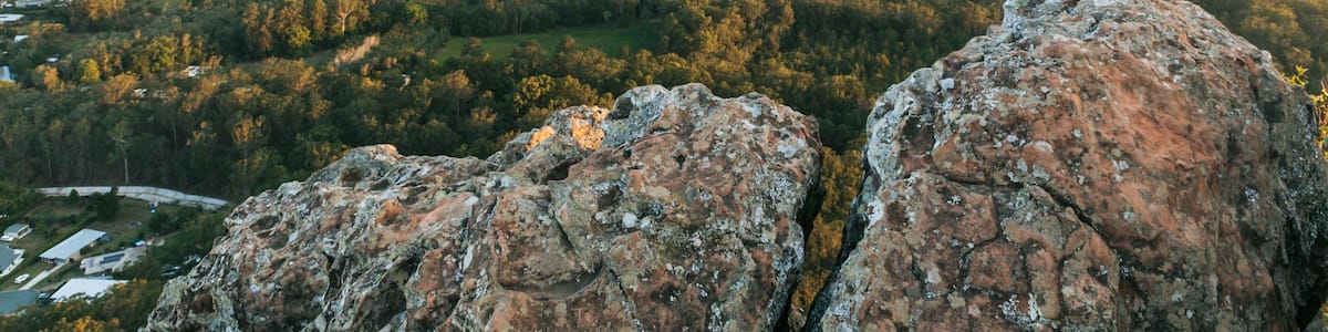 Mount Ngungun featuring landscape views, mountains and a sunset