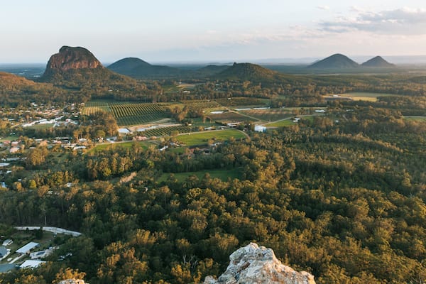A mountainous landscape with a town nestled in the valley.