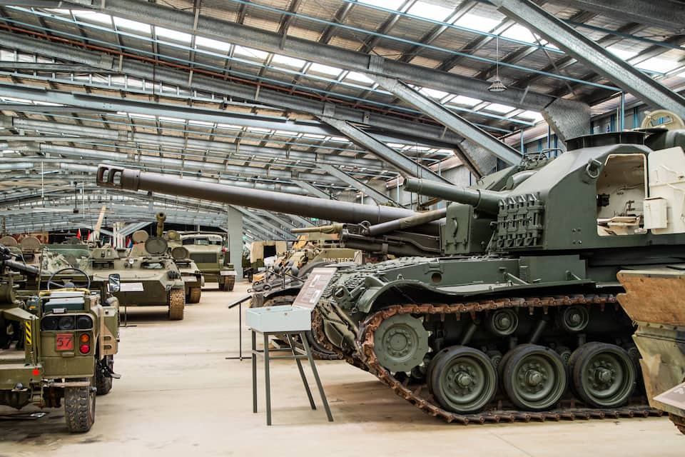 A military tank exhibition with various tanks on display.