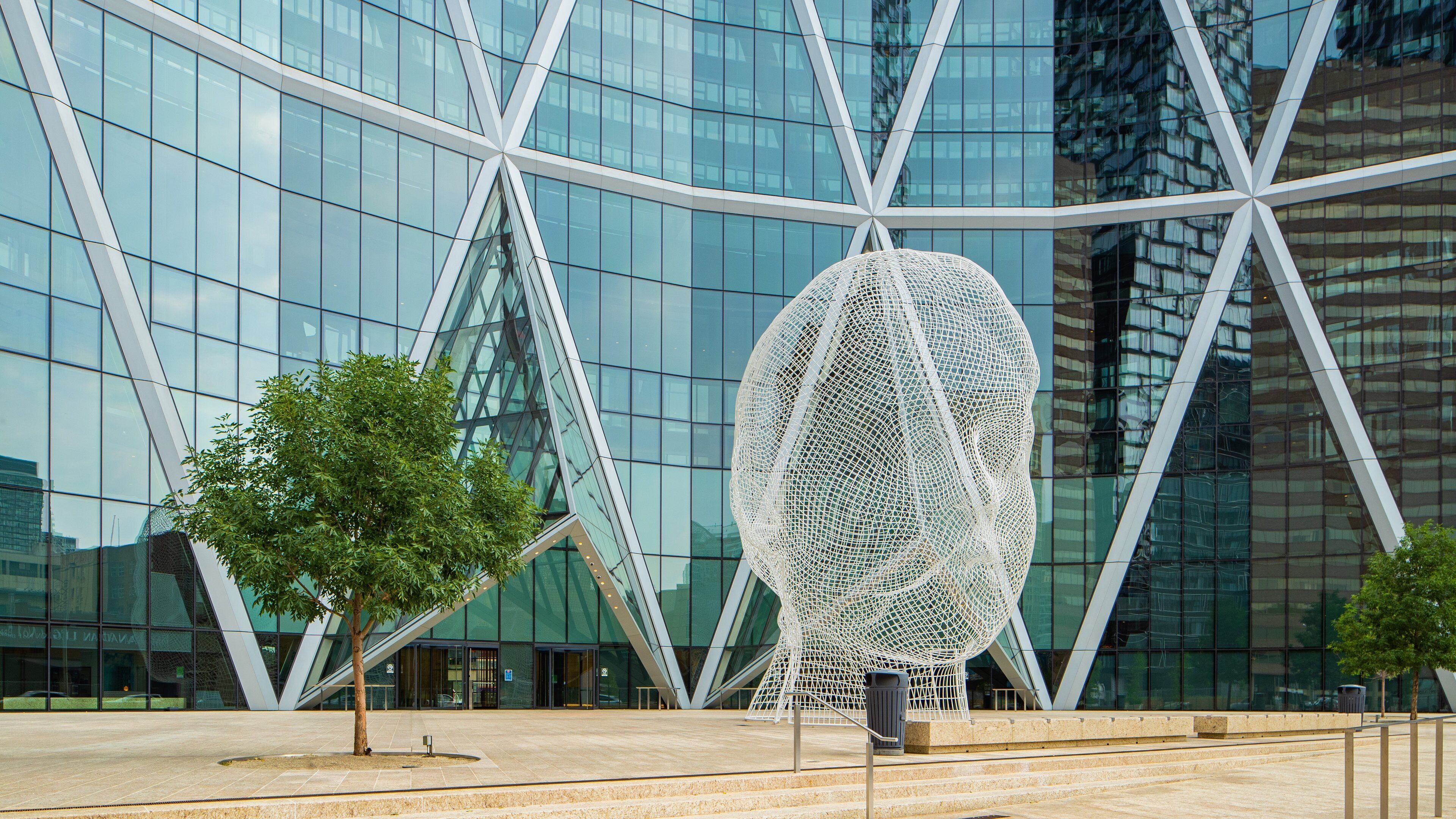 Wonderland Sculpture featuring outdoor art, a skyscraper and a city