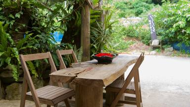 Okinawa which includes a small town or village and cafe scenes