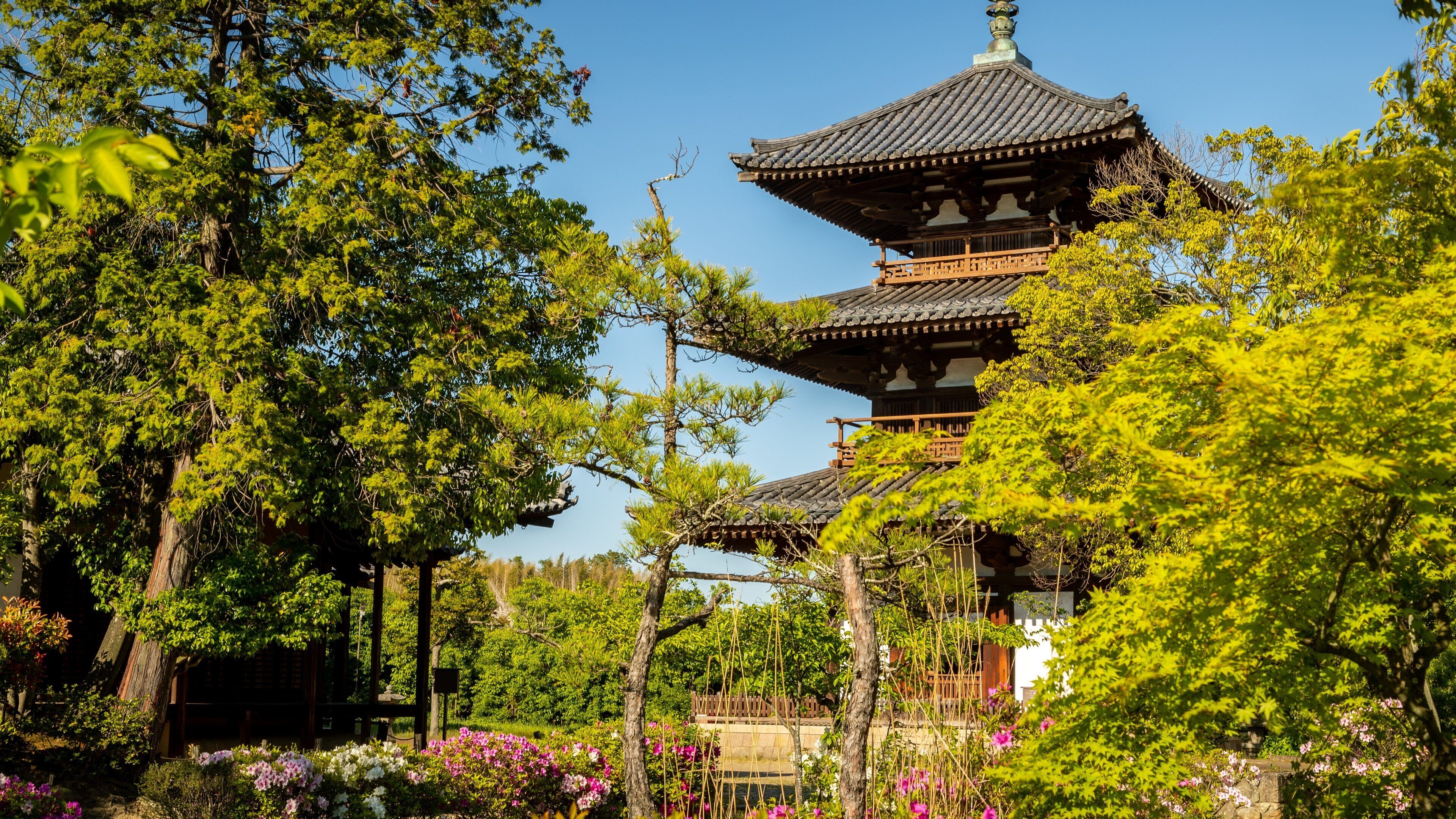 Hokiji Temple which includes a temple or place of worship, heritage elements and a park