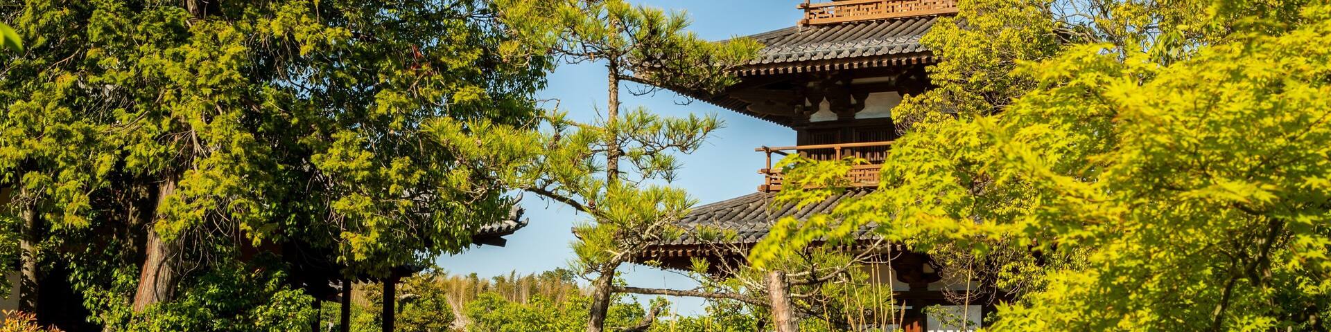 Hokiji Temple which includes a temple or place of worship, heritage elements and a park