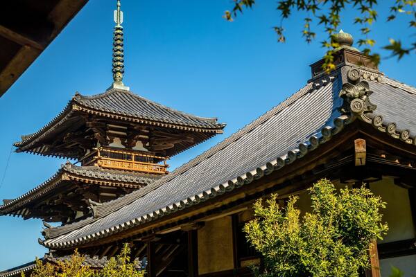 Hokiji Temple which includes a temple or place of worship and heritage elements