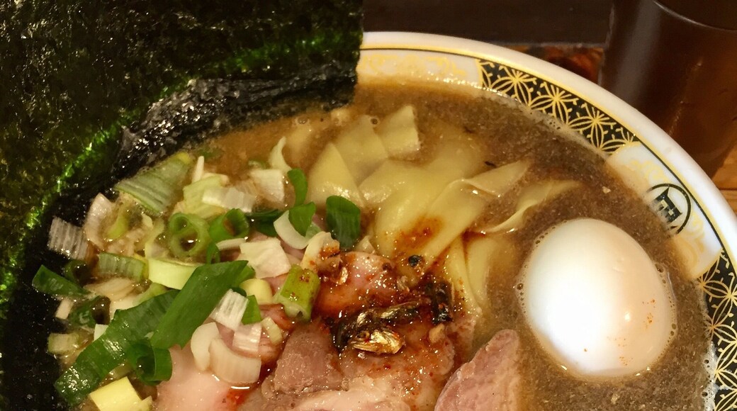Tradition tiny ramen restaurant. They only serve ramen with dry sardines - a bit hard to find. Look up for the red sign and the queue in the side narrow alley