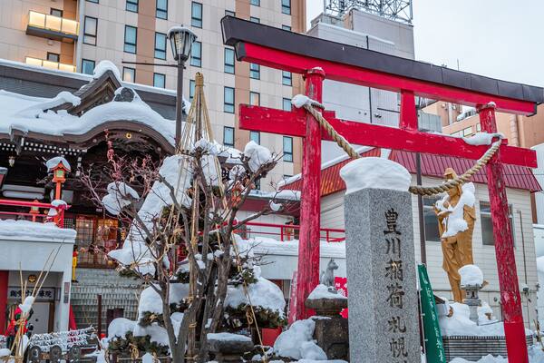 Toyokawa Inari Sapporo Betsuin showing snow and heritage elements