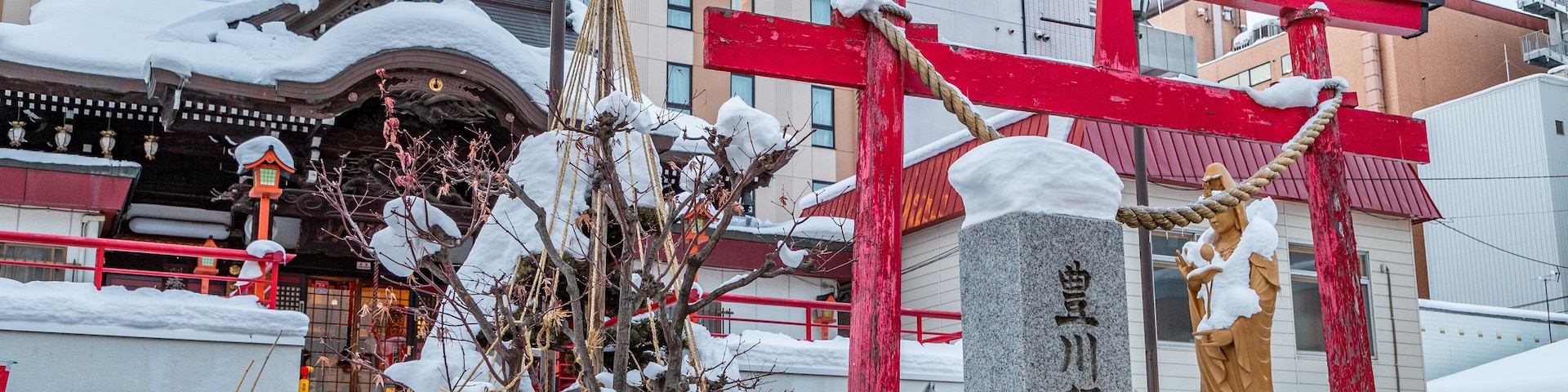 Toyokawa Inari Sapporo Betsuin showing snow and heritage elements