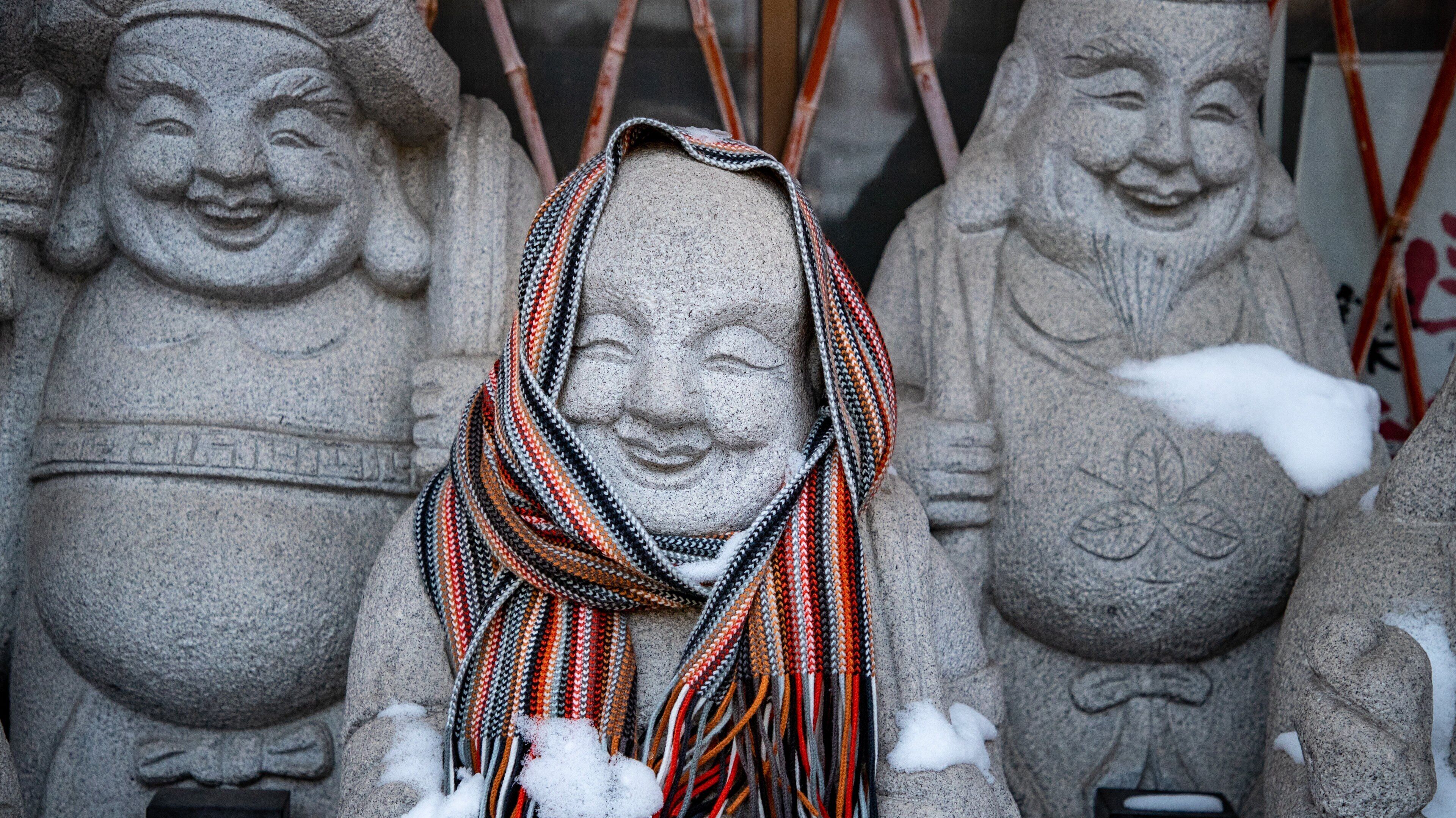 Toyokawa Inari Sapporo Betsuin featuring heritage elements and a statue or sculpture